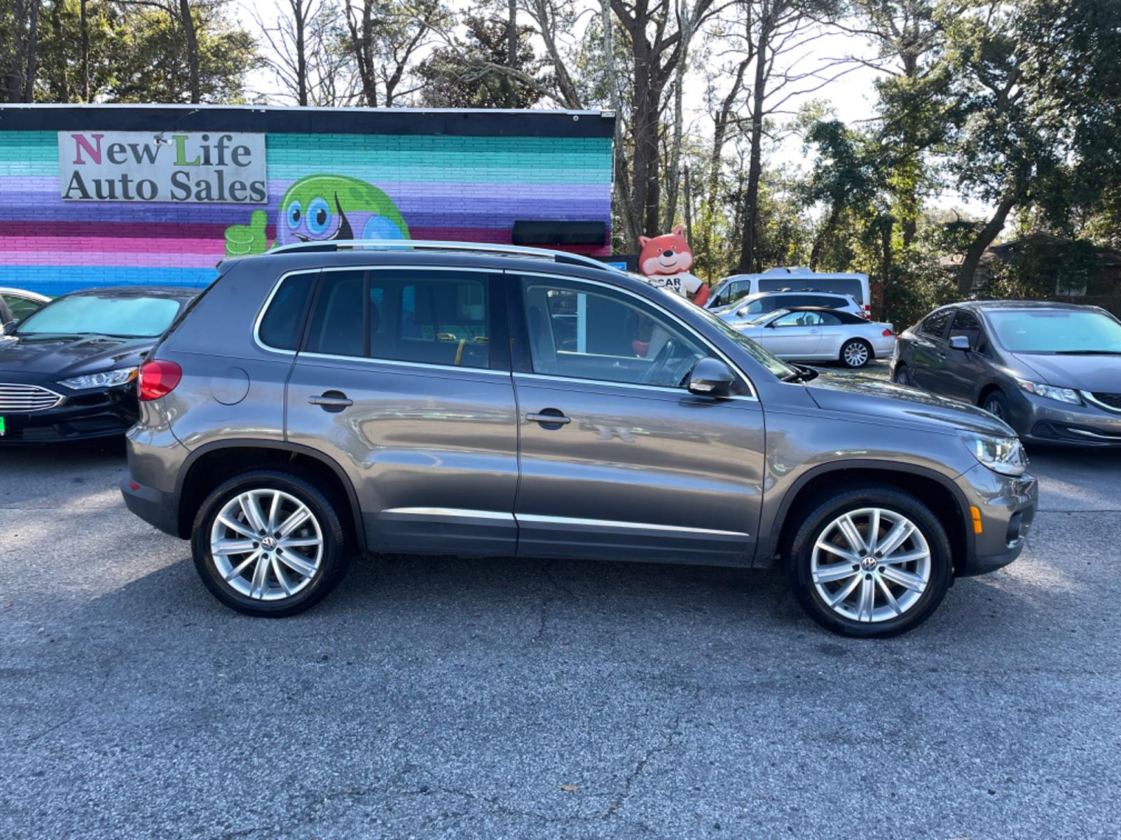 2015 GRAY VOLKSWAGEN TIGUAN S (WVGAV7AX3FW) with an 2.0L engine, Automatic transmission, located at 5103 Dorchester Rd., Charleston, SC, 29418-5607, (843) 767-1122, 36.245171, -115.228050 - Local Trade-in with Leather, Panoramic Sunroof, Navigation, Backup Camera, Fender Stereo with CD/AUX/Bluetooth, Dual Climate Control, Power Everything (windows, locks, seats, mirrors), Heated Seats, Push Button Start, Keyless Entry, Alloy Wheels. Clean CarFax (no accidents reported!) 102k miles Loc - Photo #8